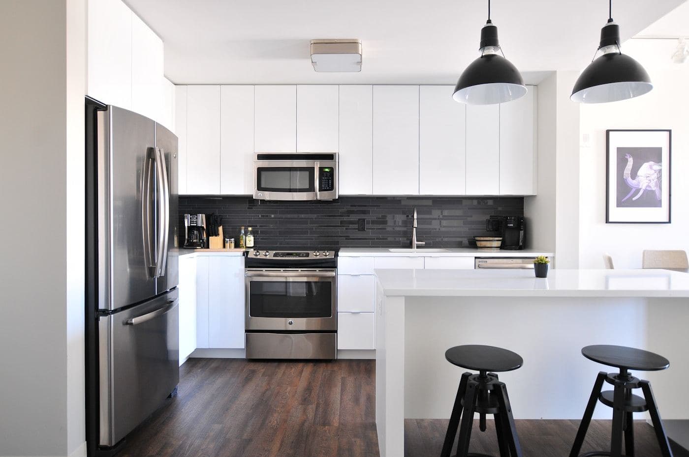 Kitchen along a long wall with open shelving