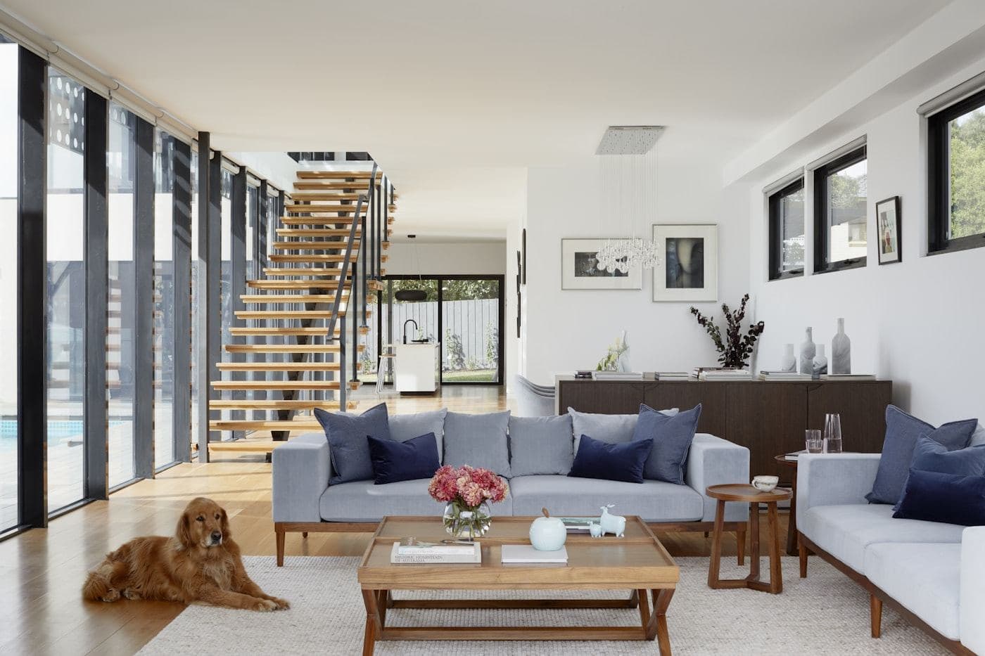 Living area with a low sofa and warm timber floor