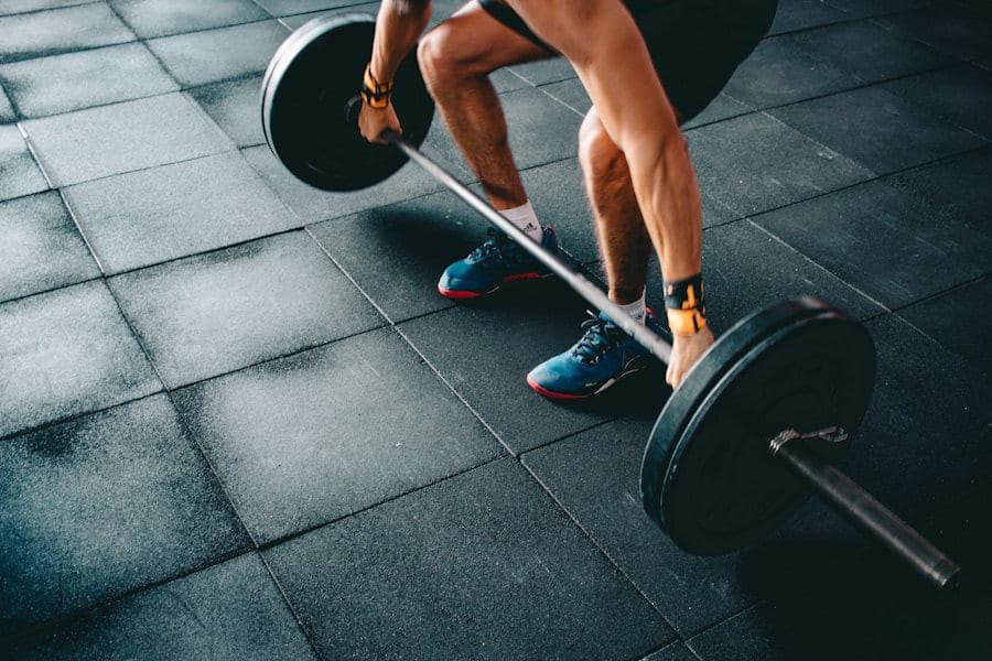 Athlete pulling a loaded barbell from the floor